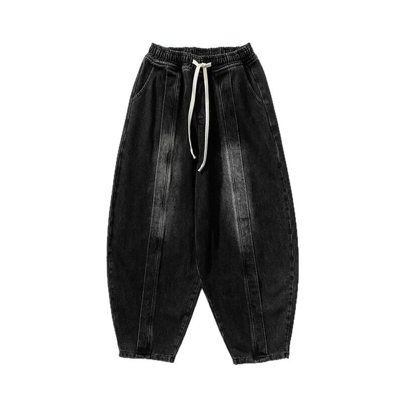 Hollow Arc Denim Trousers