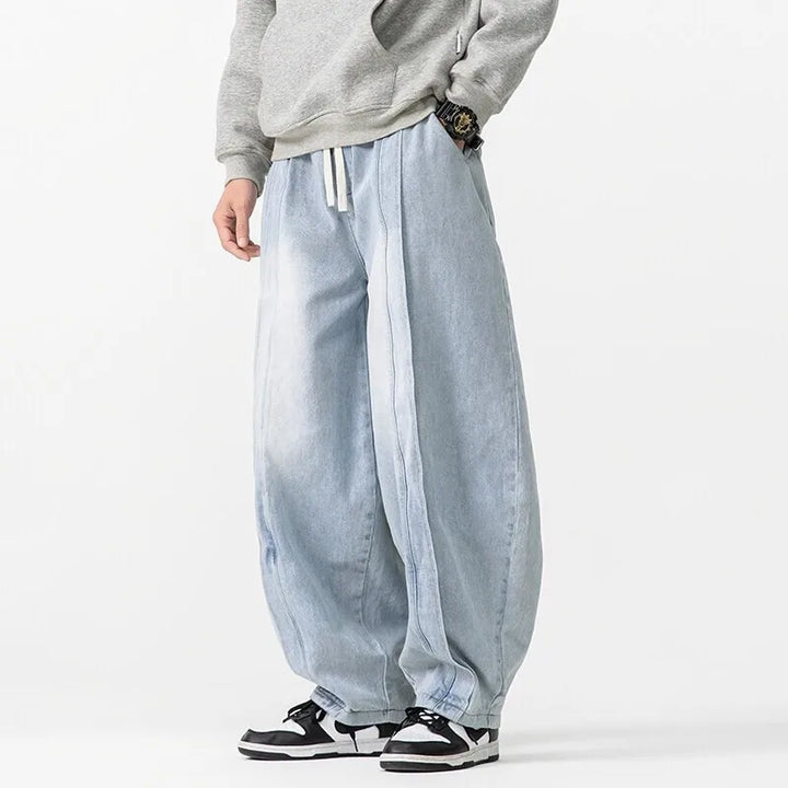 Hollow Arc Denim Trousers