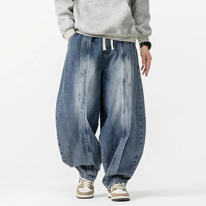 Hollow Arc Denim Trousers
