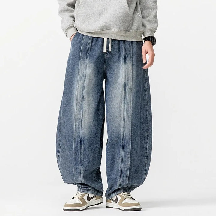 Hollow Arc Denim Trousers