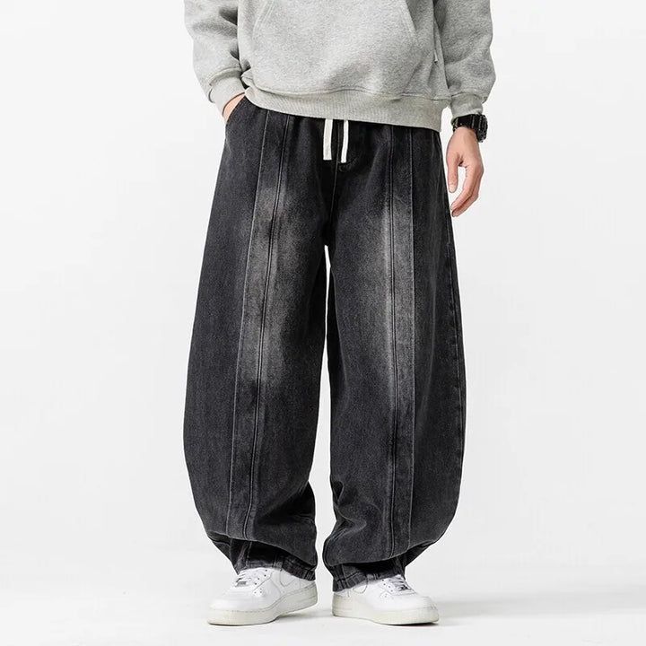 Hollow Arc Denim Trousers