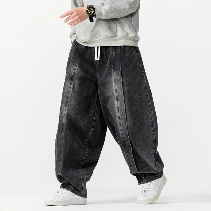 Hollow Arc Denim Trousers