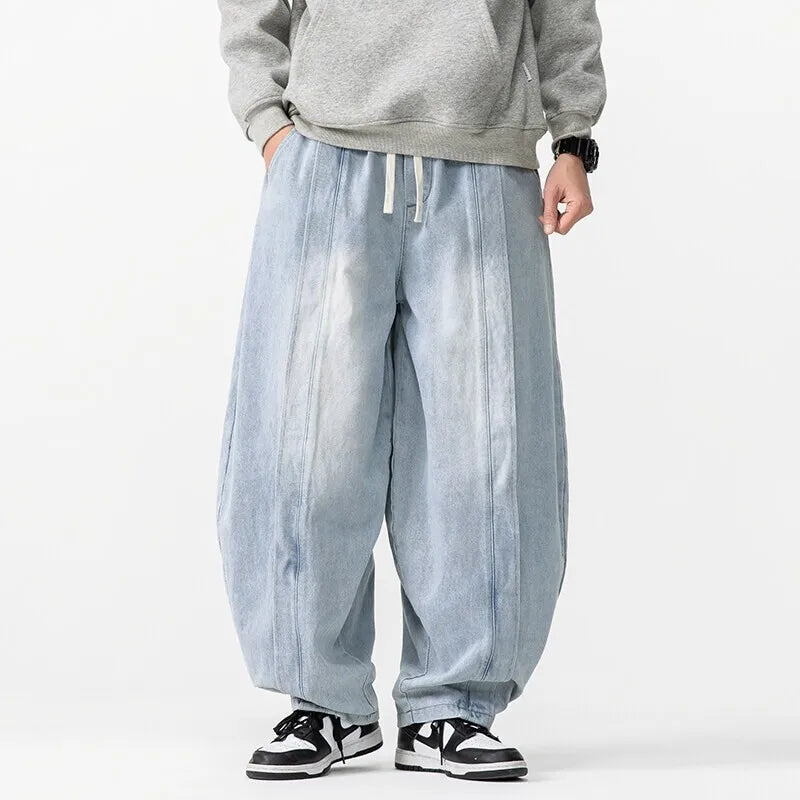 Hollow Arc Denim Trousers