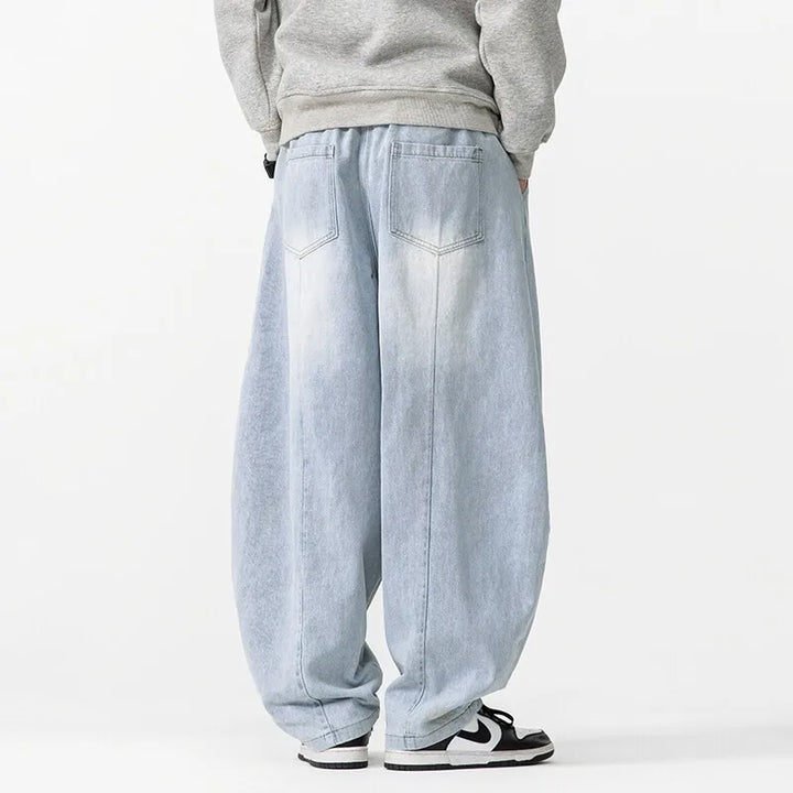 Hollow Arc Denim Trousers